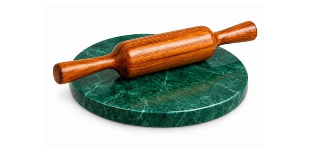 Green marble chakla with wooden belan for roti making