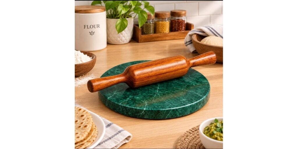 Green marble chakla with wooden belan in modern kitchen